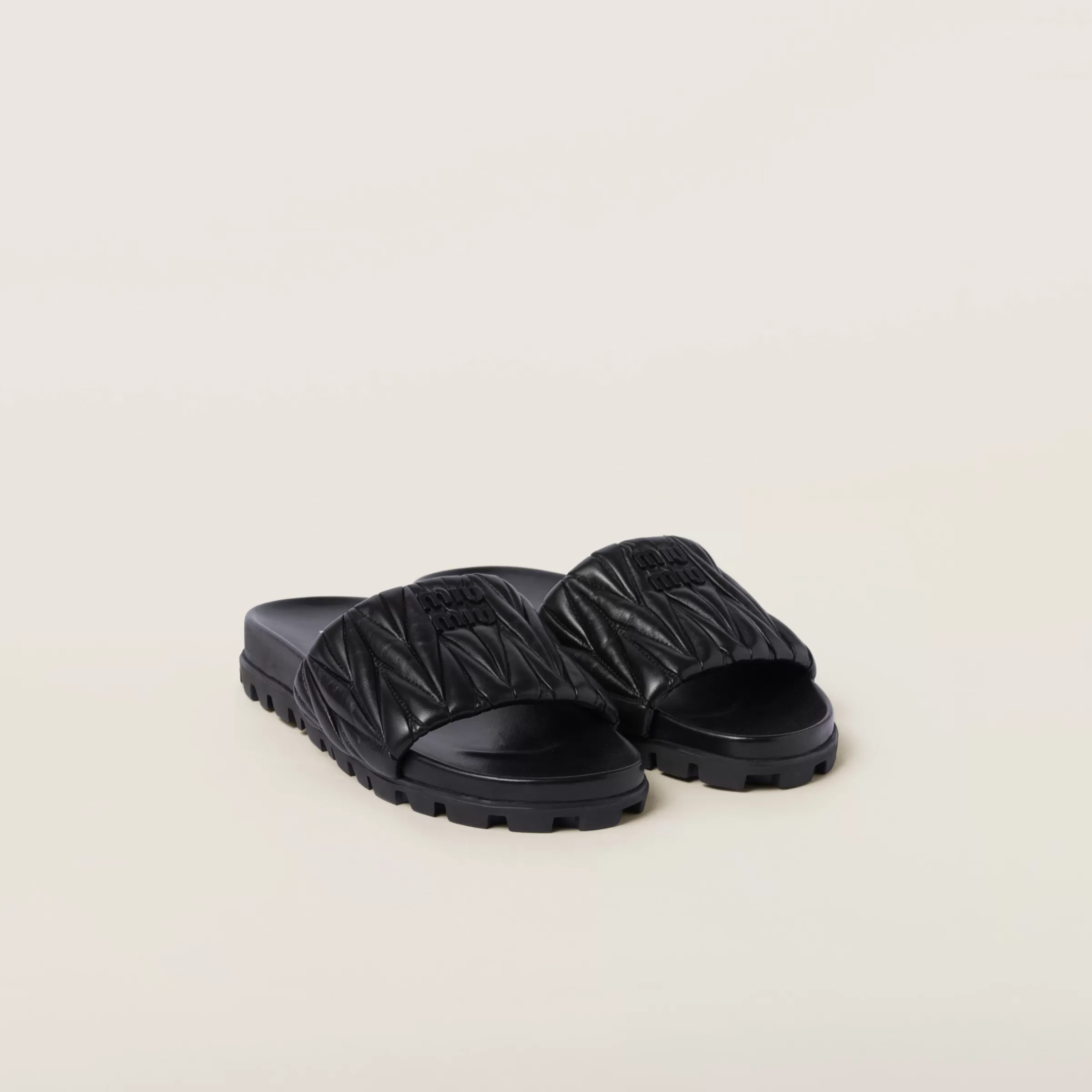 Miu Miu Matelassé Nappa Leather Slides |