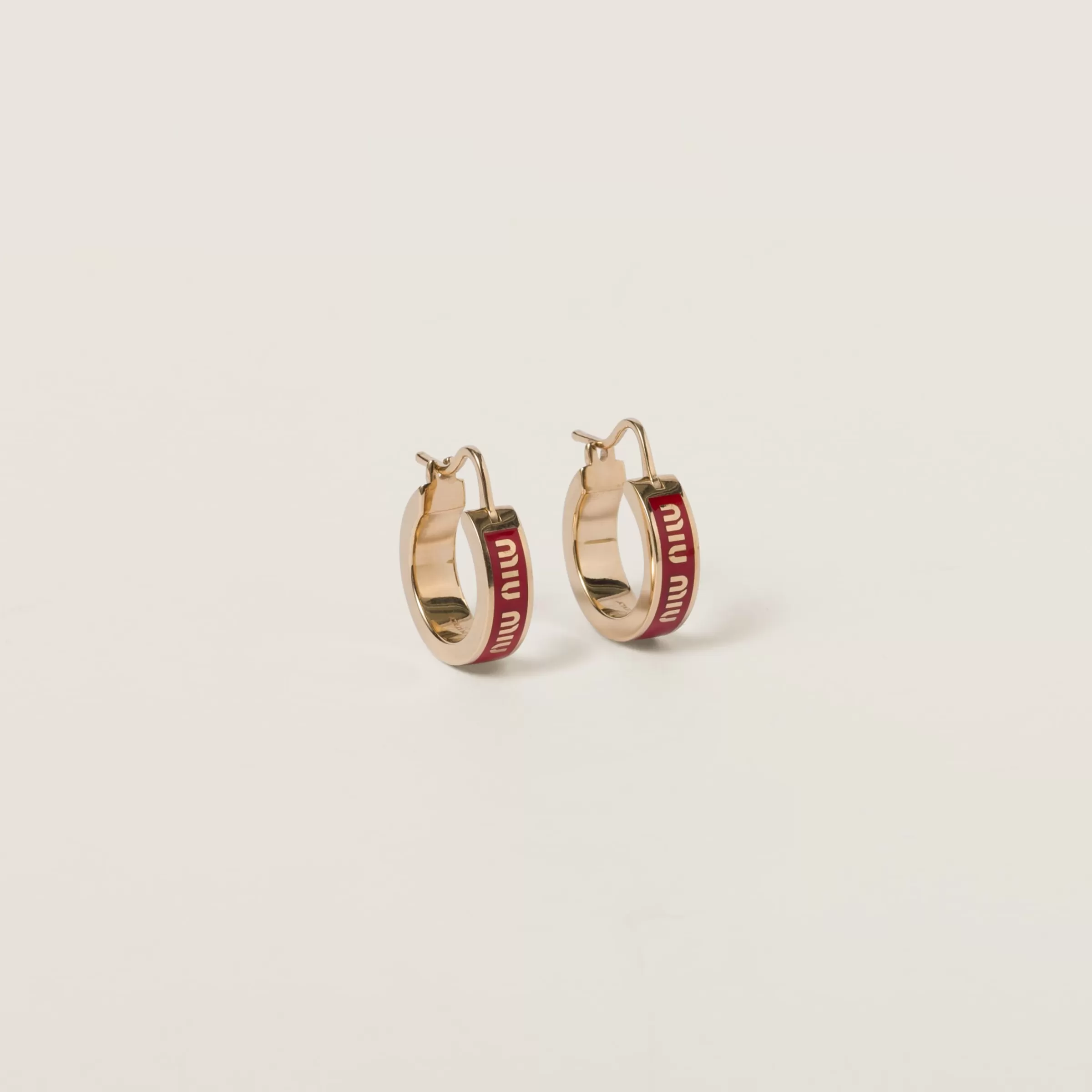 Miu Miu Enameled Metal Earrings |